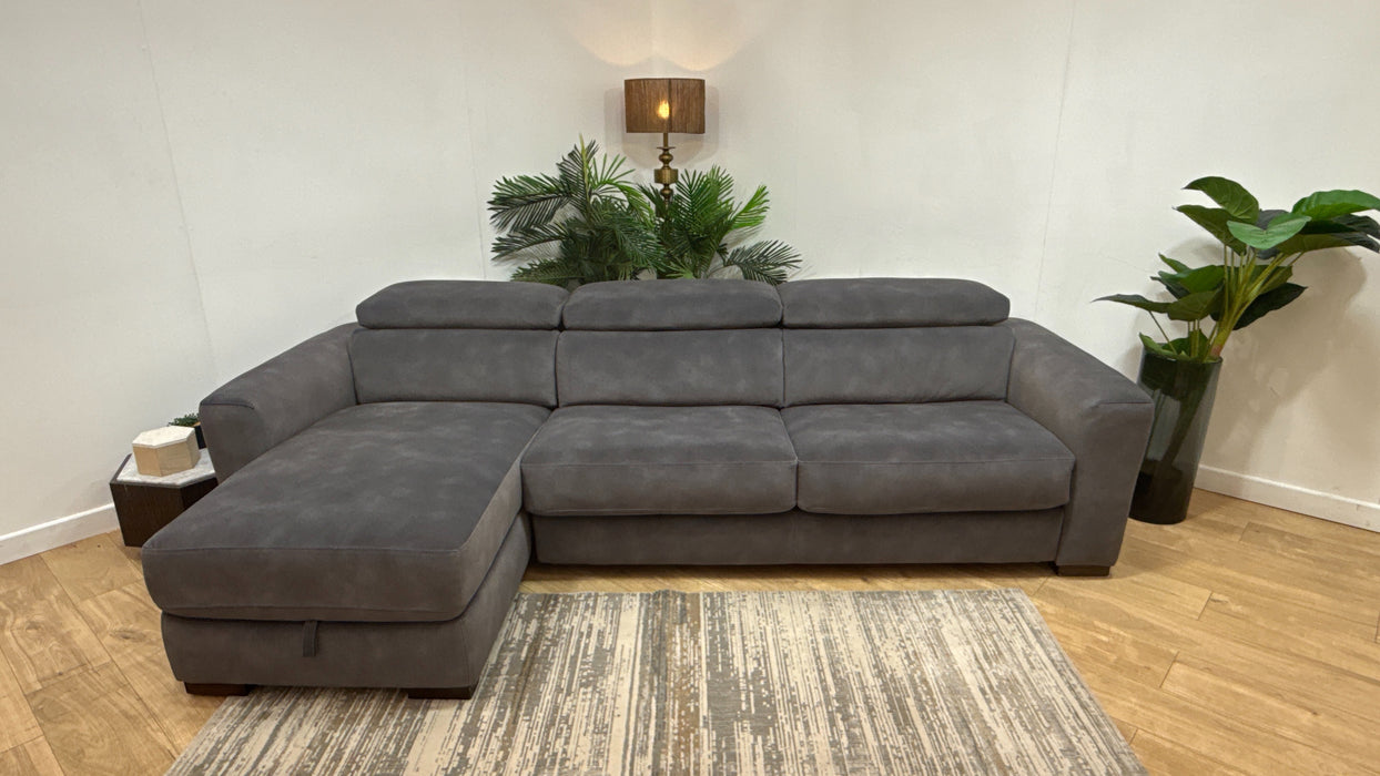 Sofology Metropolitan Fabric Chaise 4 Seater Sofabed with Storage in Lifestyle Mottled Charcoal