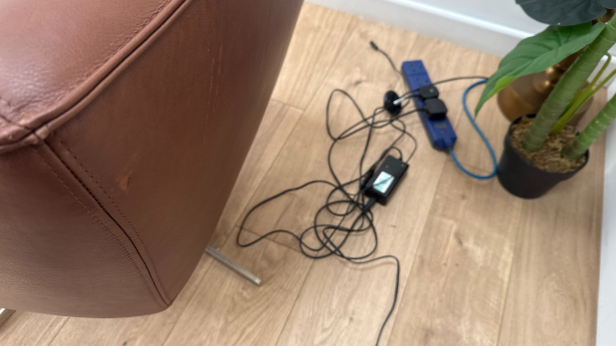 Sofology Adler Leather Swivel Chair in Relaxed Soft Brown