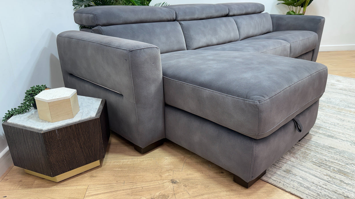 Sofology Metropolitan Fabric Chaise 4 Seater Sofabed with Storage in Lifestyle Mottled Charcoal