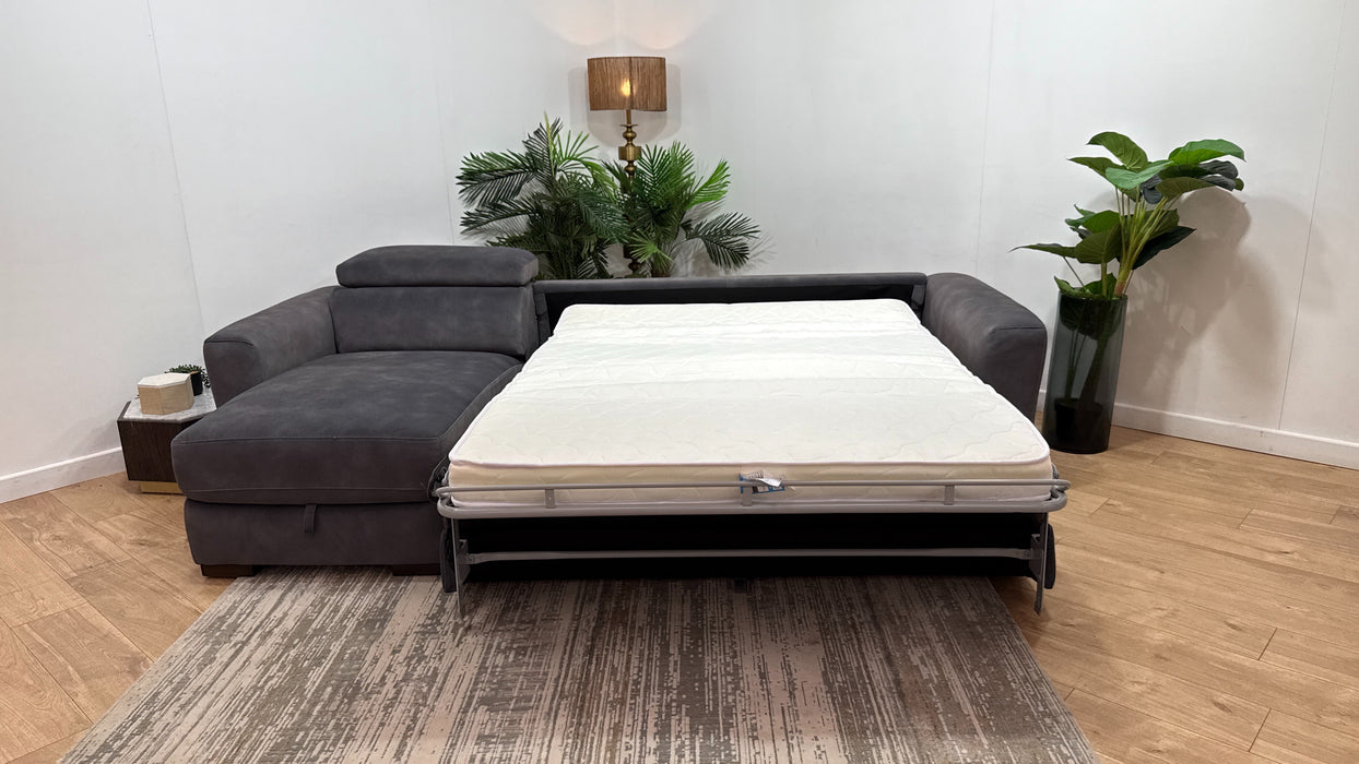 Sofology Metropolitan Fabric Chaise 4 Seater Sofabed with Storage in Lifestyle Mottled Charcoal