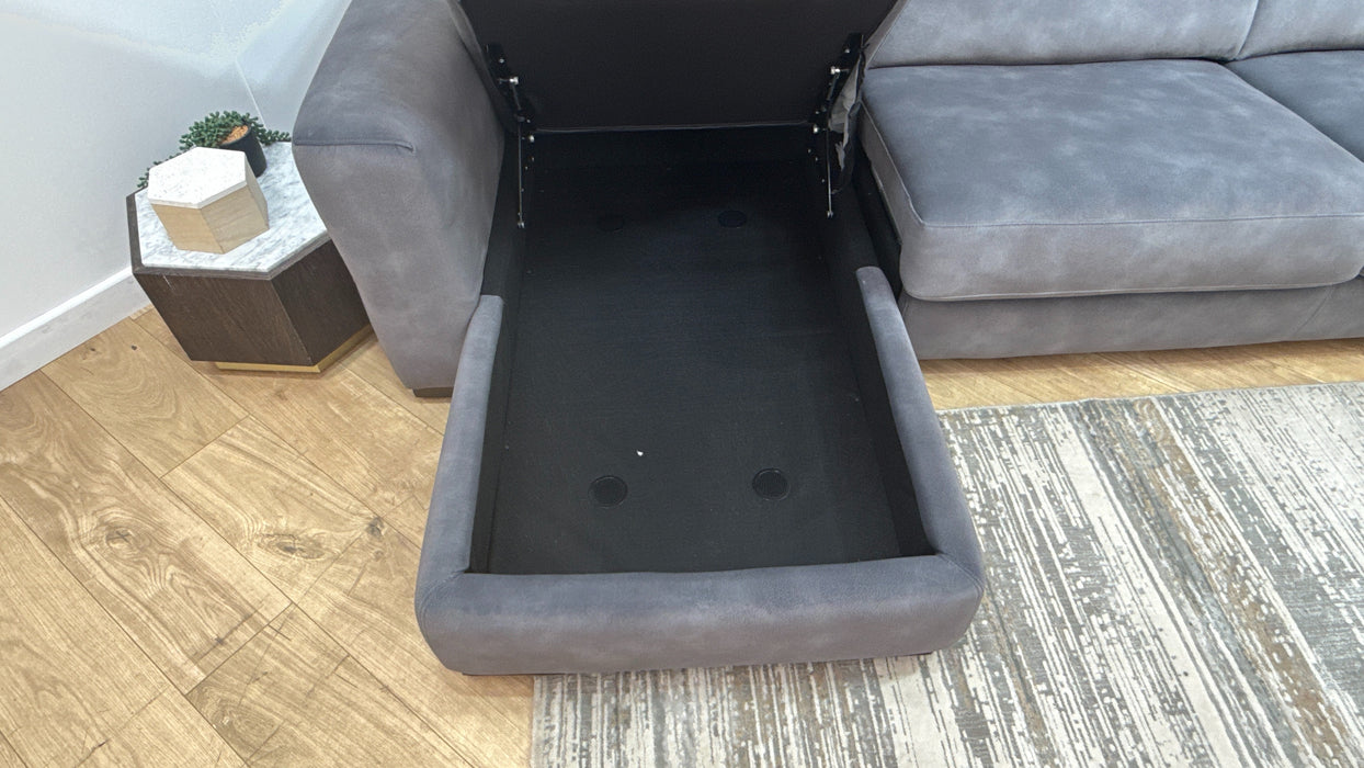 Sofology Metropolitan Fabric Chaise 4 Seater Sofabed with Storage in Lifestyle Mottled Charcoal