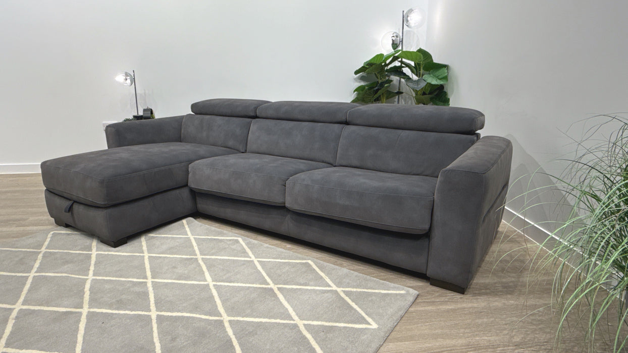 Sofology Metropolitan Fabric Chaise 4 Seater Sofa Bed with Storage in Lifestyle Mottled Charcoal