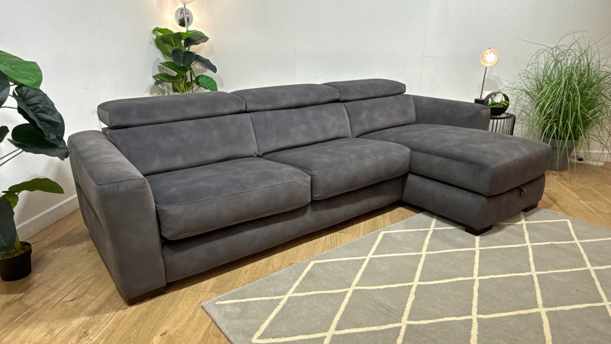 Sofology Metropolitan Fabric 4 Seater Chaise Sofa Bed with Storage in Lifestyle Mottled Charcoal