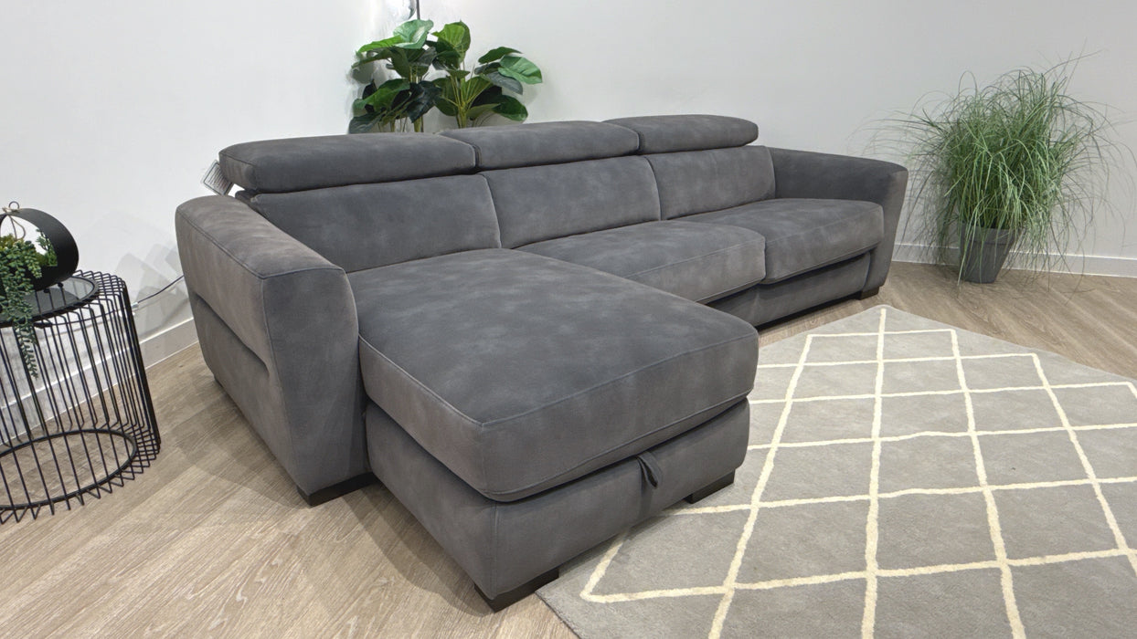 Sofology Metropolitan Fabric Chaise 4 Seater Sofa Bed with Storage in Lifestyle Mottled Charcoal