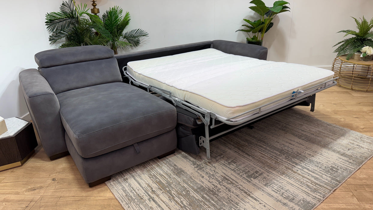 Sofology Metropolitan Fabric Chaise 4 Seater Sofabed with Storage in Lifestyle Mottled Charcoal