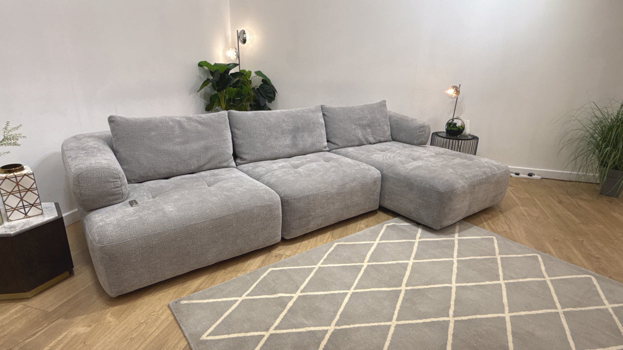 Sofology Fabric Flex 4 Seater Chaise Large Full Back Power Motion Back in Heavy Textured Chenille Light Grey