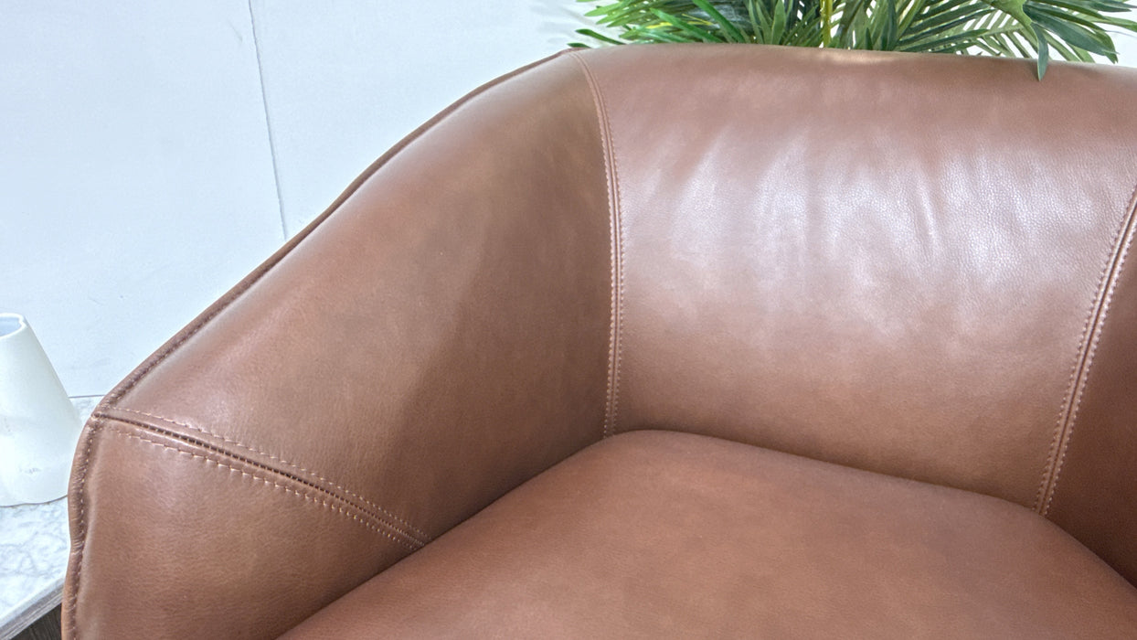 Sofology Adler Leather Swivel Chair in Relaxed Soft Brown