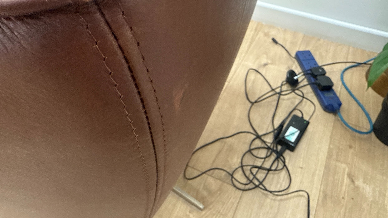 Sofology Adler Leather Swivel Chair in Relaxed Soft Brown