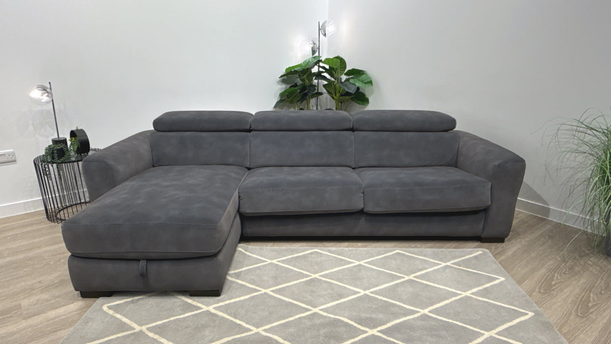 Sofology Metropolitan Fabric Chaise 4 Seater Sofa Bed with Storage in Lifestyle Mottled Charcoal