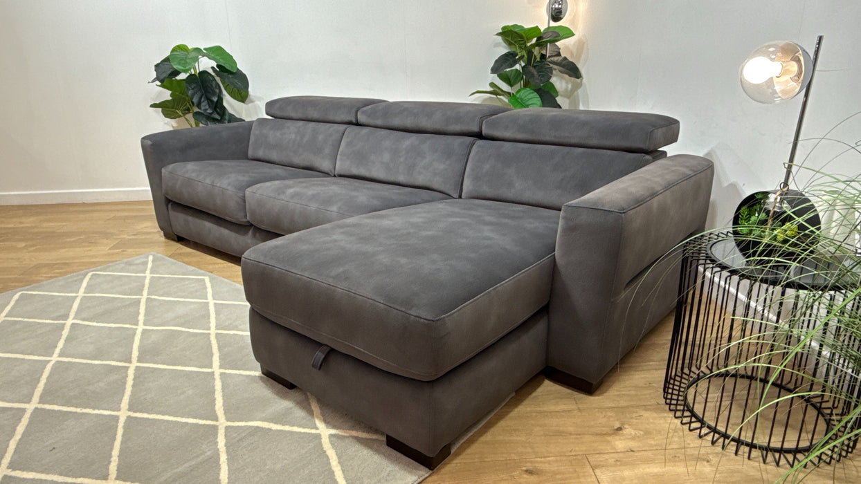 Sofology Metropolitan Fabric 4 Seater Chaise Sofa Bed with Storage in Lifestyle Mottled Charcoal