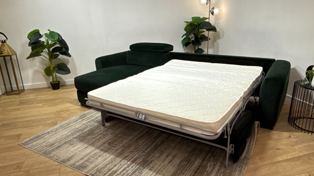 Sofology Metropolitan Fabric Chaise 4 Seater Sofa Bed with Storage in Lifestyle Mottled Dark Green