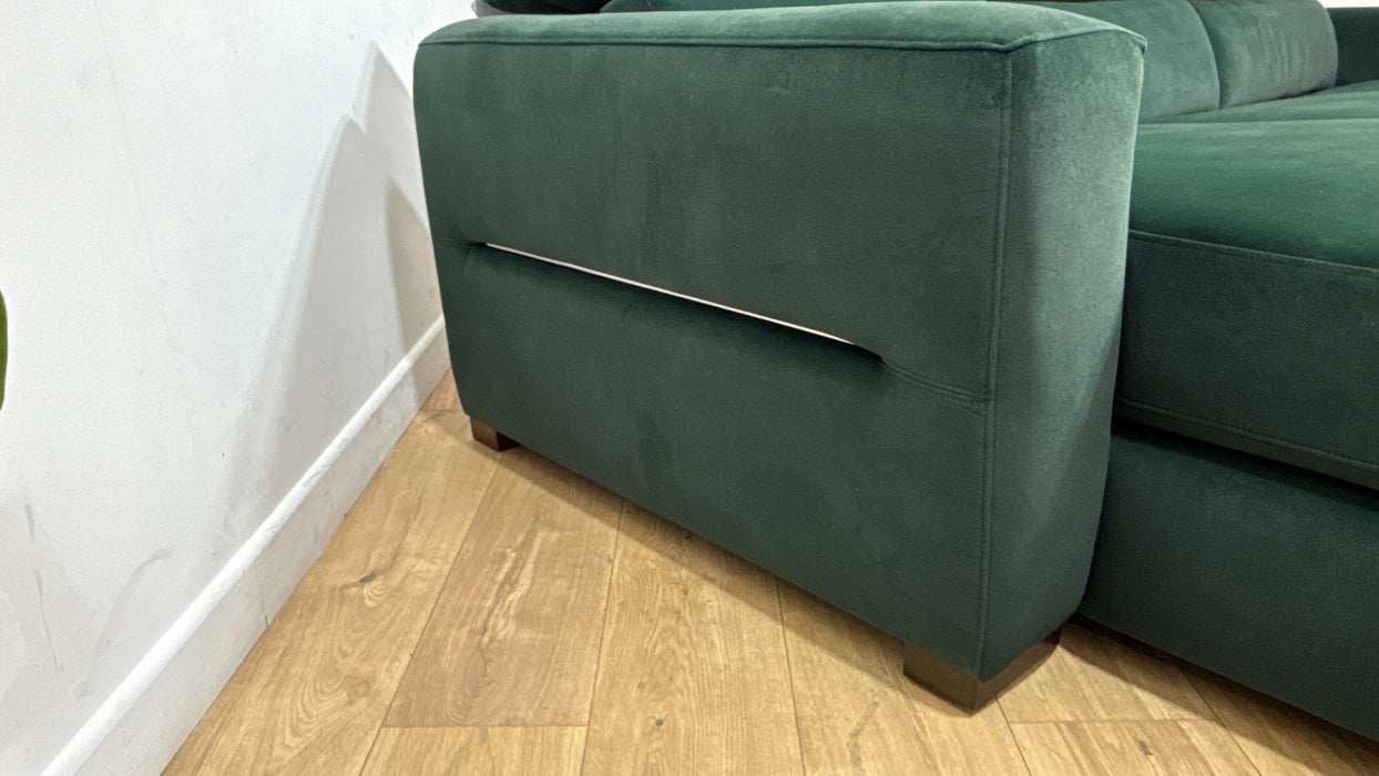 Sofology Metropolitan Fabric Chaise 4 Seater Sofa Bed with Storage in Lifestyle Mottled Dark Green