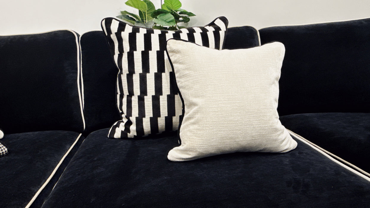 Sofology Atelier 4 Seater Full Back Asymmetrical in soft chenille ebony mix with pearl contrast piping