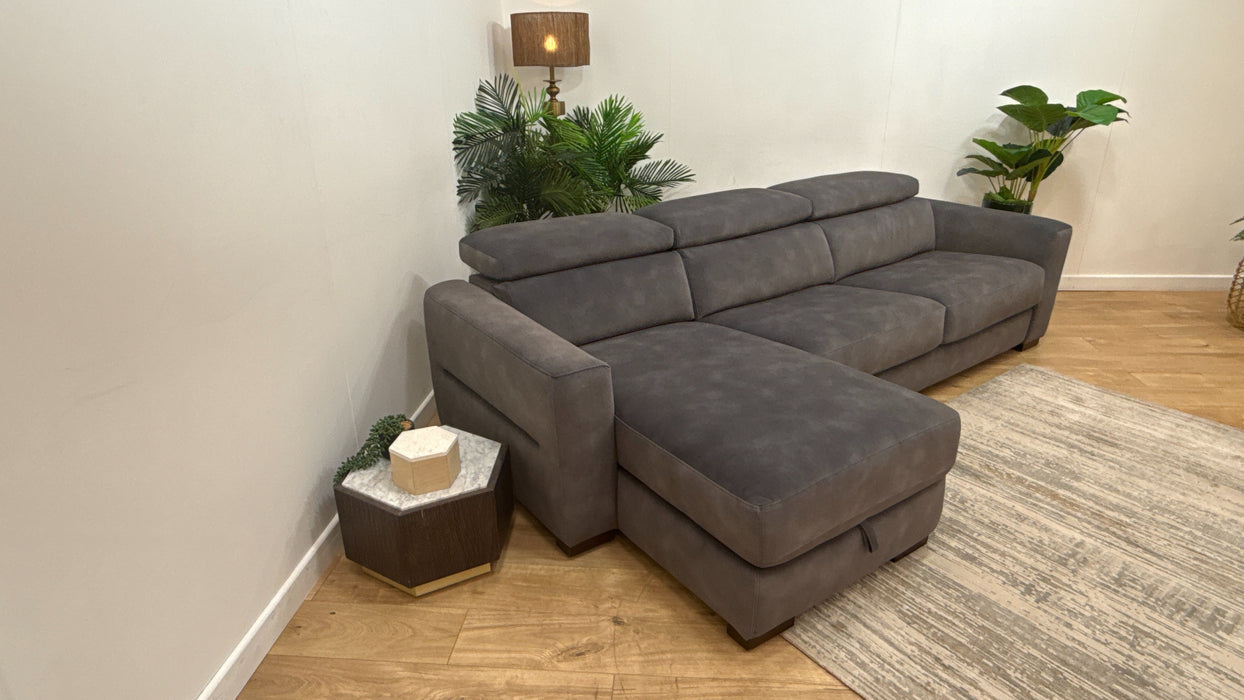 Sofology Metropolitan Fabric Chaise 4 Seater Sofabed with Storage in Lifestyle Mottled Charcoal