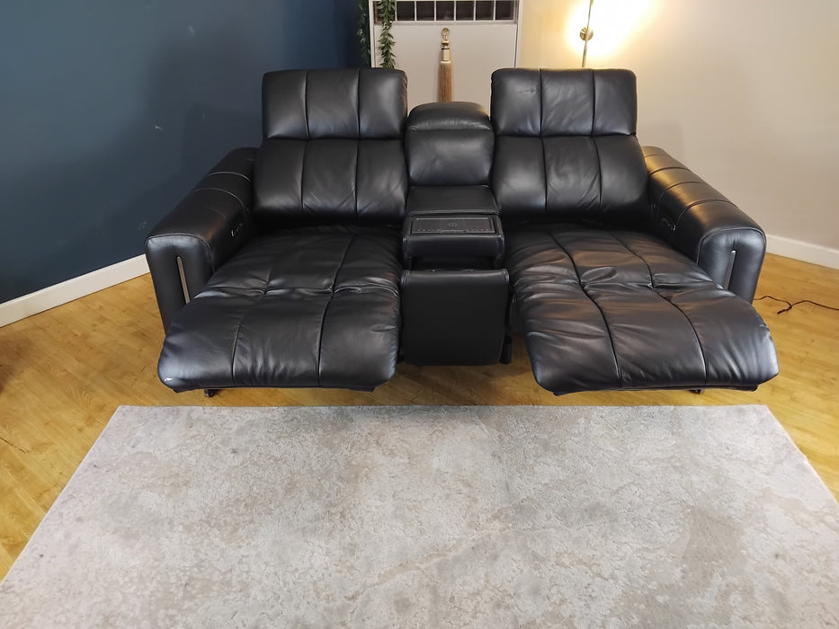 Sofology The Paramount Leather 2 Seater Console Power Recliner/Headrest Heated Seat Speakers in Trusty Embossed Jet Black