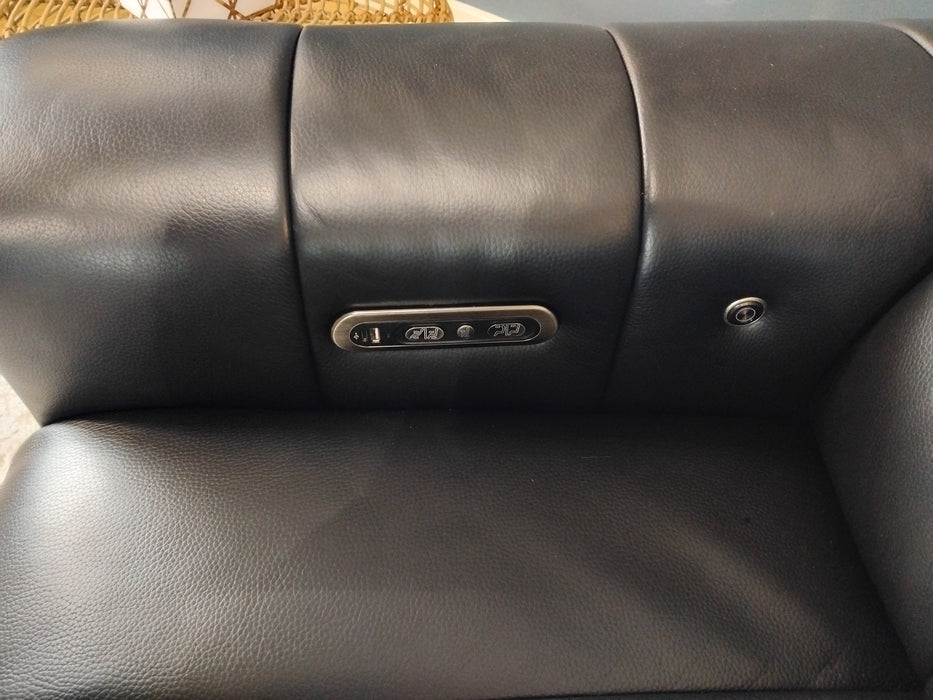 Sofology The Paramount Leather 2 Seater Console Power Recliner/Headrest Heated Seat Speakers in Trusty Embossed Jet Black