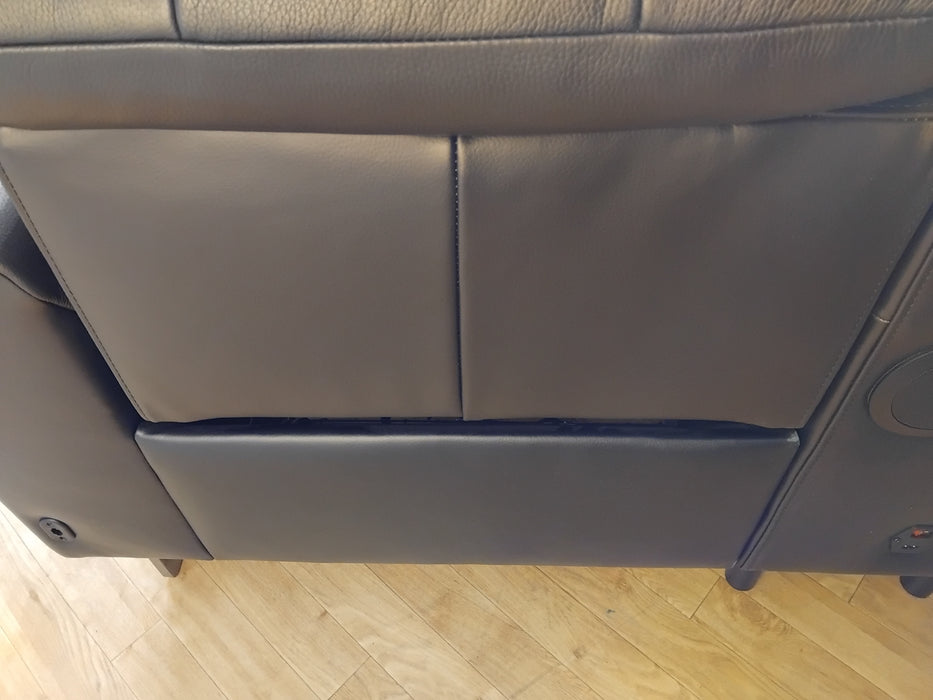 Sofology The Paramount Leather 2 Seater Console Power Recliner/Headrest Heated Seat Speakers in Trusty Embossed Jet Black